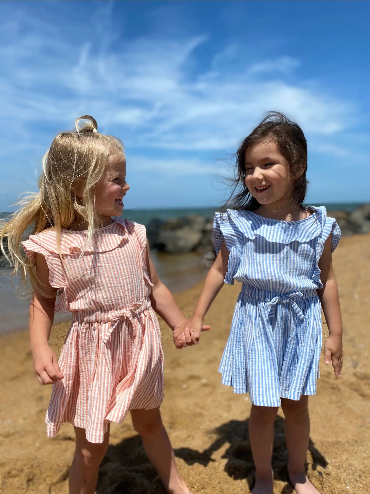 sandy romper in peach stripe