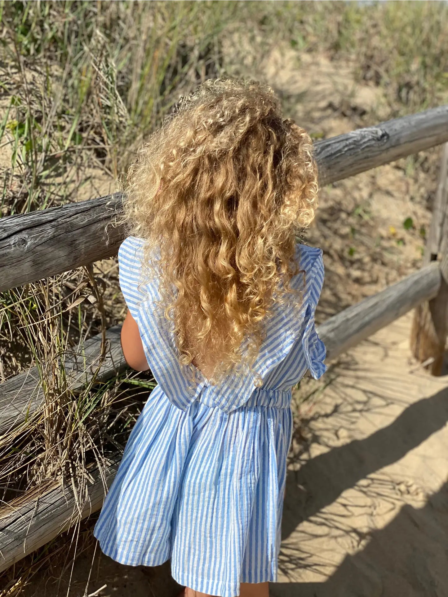 sandy romper in blue stripe